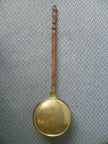 Una padella scalda - letto, epoca